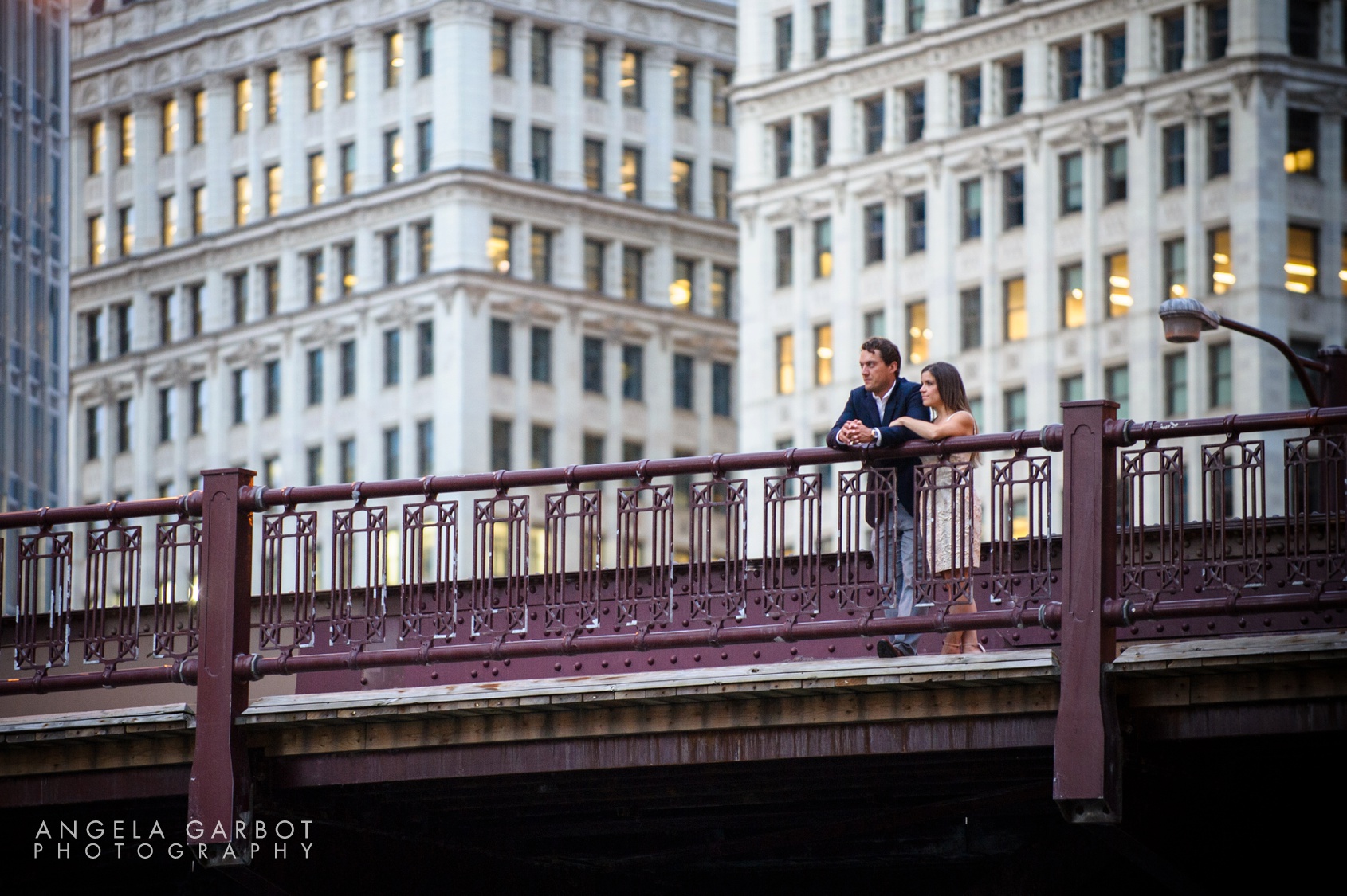 Chicago pre-wedding engagement session along the Riverwalk and the Wrigley Building in downtown Chicago.